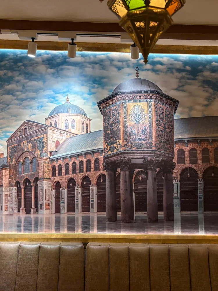 Hand-painted mural of the Umayyad Mosque of Damascus inside Syrian House