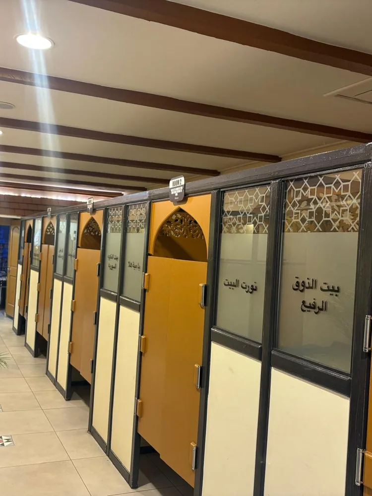 Private family dining rooms at Syrian House with traditional Arabic latticework doors